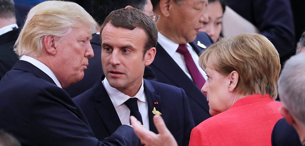 Президент США Дональд Трамп, президент Франции Эммануэль Макрон и федеральный канцлер Германии Ангела Меркель (слева направо)