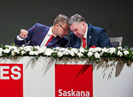 Нил Ушаков и Янис Урбанович на съезде партии Согласие