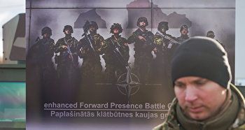 Плакат Боевой группы НАТО в Латвии