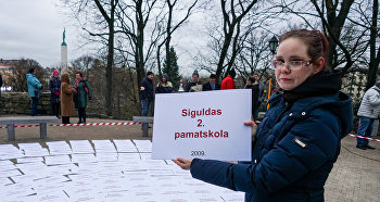 Частица флешмоба-акции в память о закрытых в Латвии учебных заведениях, Рига, 22 ноября 2018