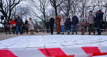 Штаб защиты русских школ провел "Флешмоб-акцию в память о закрытых в Латвии учебных заведениях" в Риге, 22 ноября 2018 