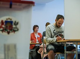 Голосование на выборах в Европарлемент на одном из избирательных участков Риги, 25 мая 2019