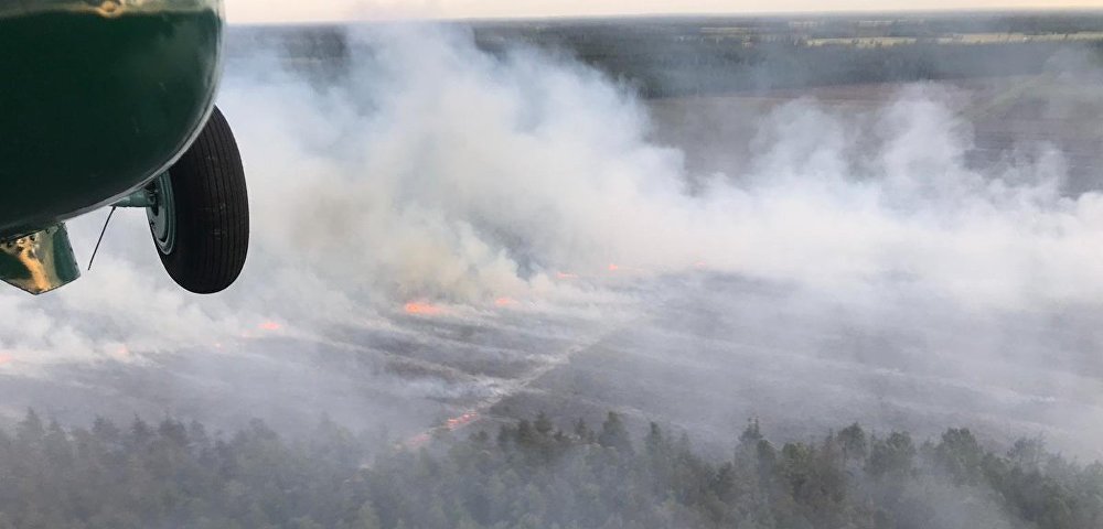 Работы по тушению лесных пожаров в Карсавском краю, Латвия